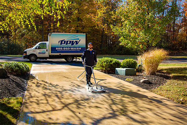 Hydro Savage Pressure Washing technician surface cleaning concrete