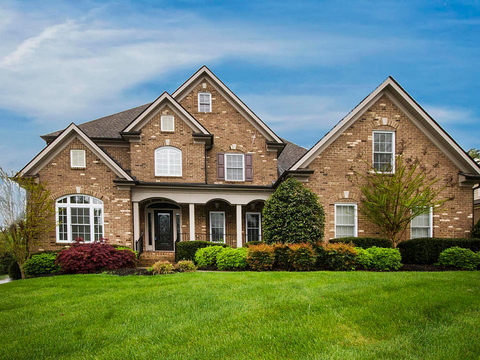 Hydro Savage Pressure Washing sign in front of home that just had services completed